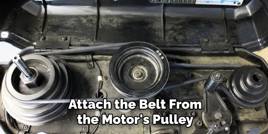 Attach the Belt From the Motor's Pulley