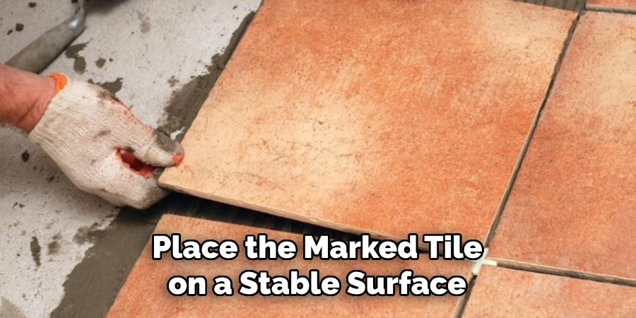 Place the Marked Tile on a Stable Surface