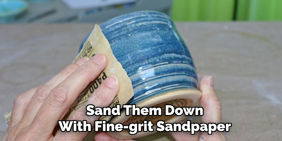 Sand Them Down With Fine-grit Sandpaper