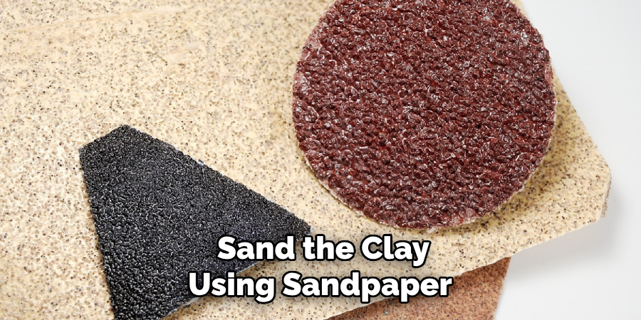 Sand the Clay Using Sandpaper 