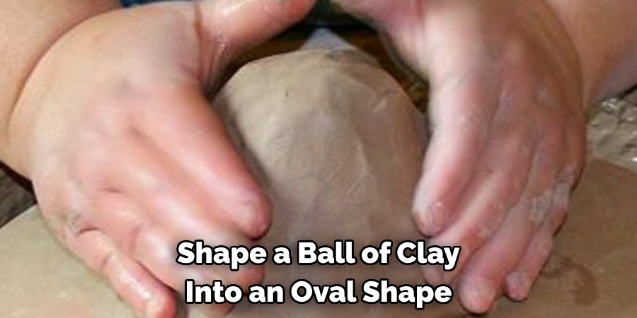 Shape a Ball of Clay Into an Oval Shape