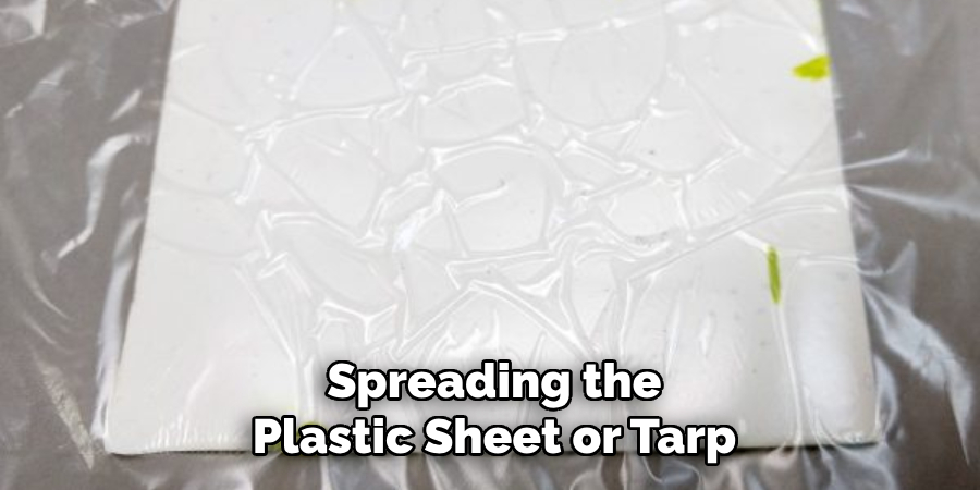 Spreading the Plastic Sheet or Tarp