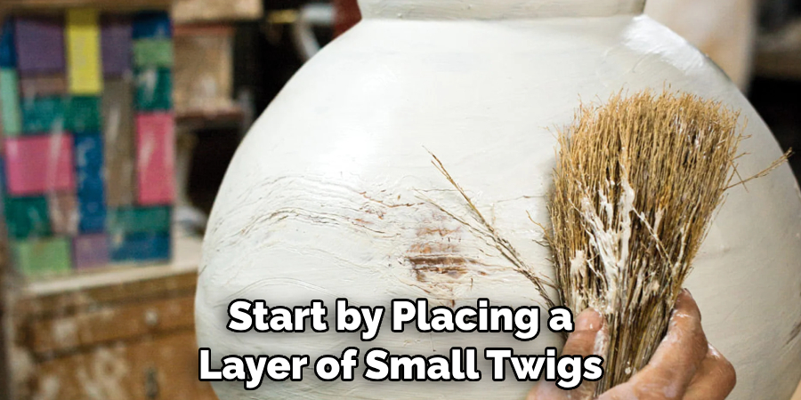 Start by Placing a Layer of Small Twigs