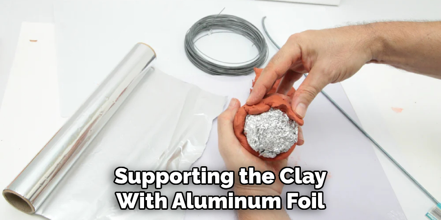 Supporting the Clay With Aluminum Foil