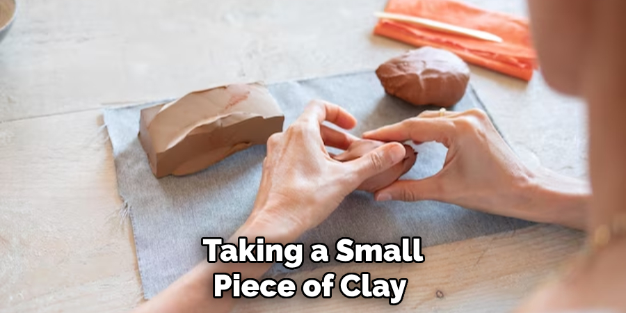 Taking a Small Piece of Clay 