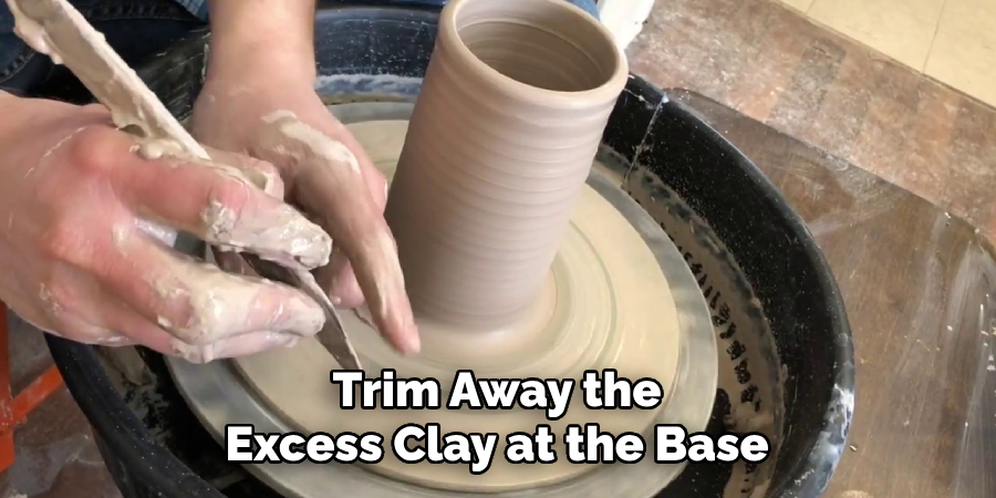 Trim Away the Excess Clay at the Base