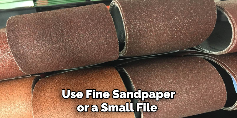  Use Fine Sandpaper or a Small File