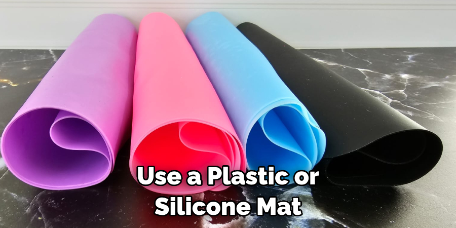 Use a Plastic or Silicone Mat