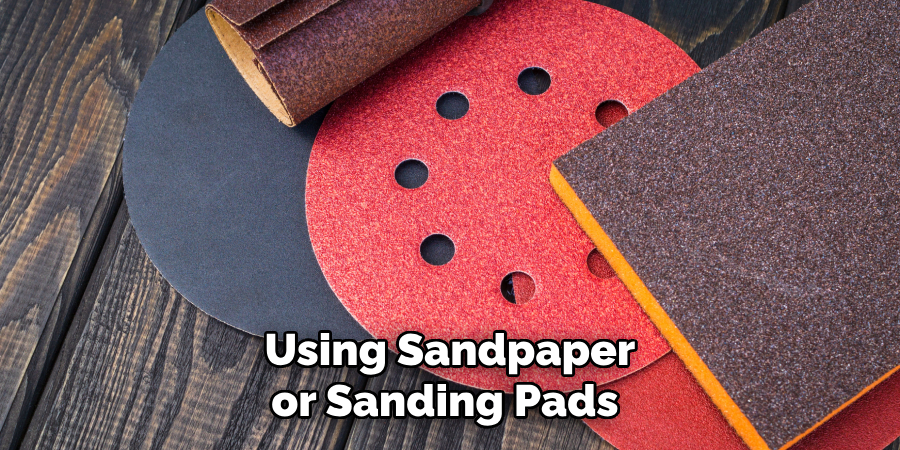 Using Sandpaper or Sanding Pads