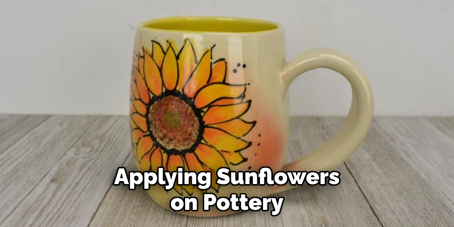 Applying Sunflowers on Pottery