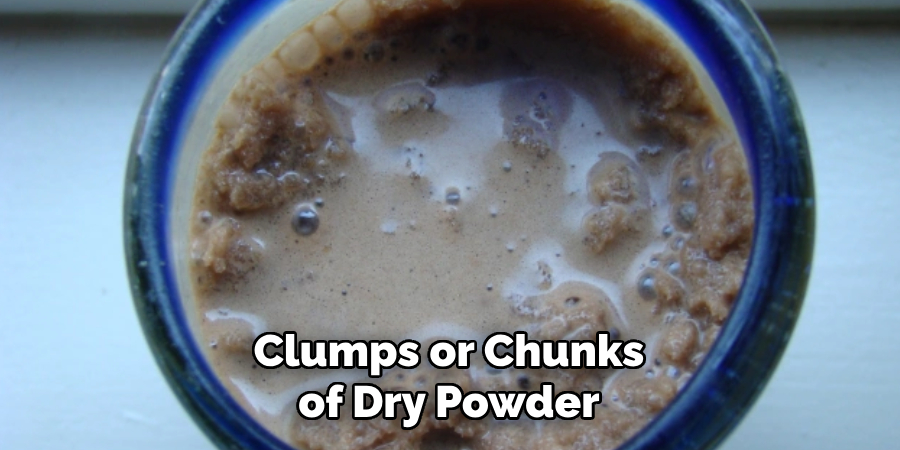 Clumps or Chunks of Dry Powder