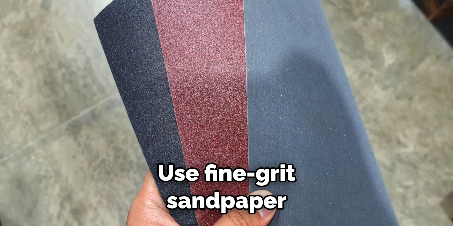 Use fine-grit sandpaper