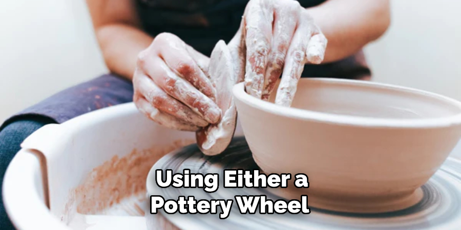 Using Either a Pottery Wheel 