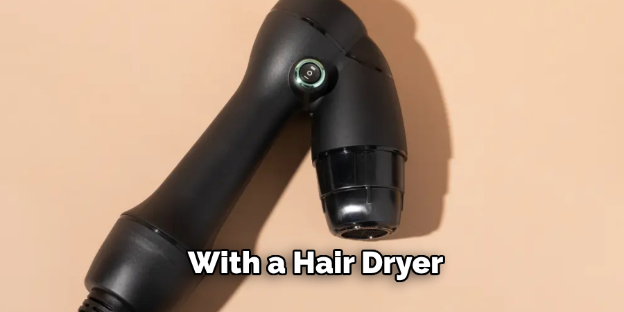 With a Hair Dryer