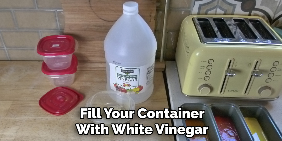 Fill Your Container With White Vinegar