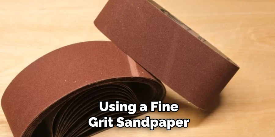 Using a Fine Grit Sandpaper