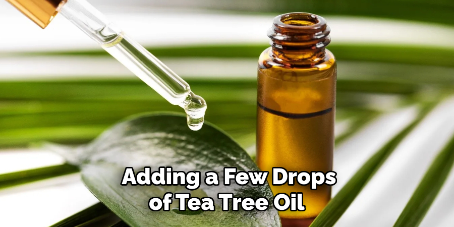 Adding a Few Drops of Tea Tree Oil 