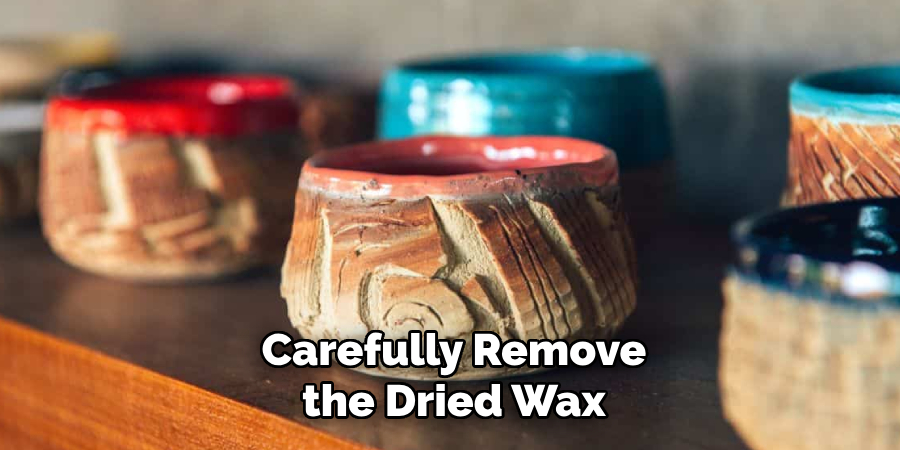 Carefully Remove the Dried Wax