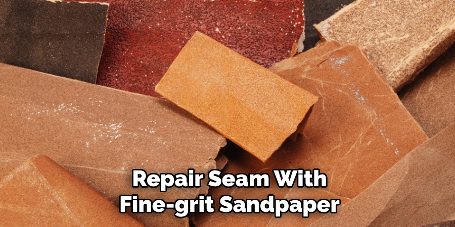 Repair Seam With Fine-grit Sandpaper