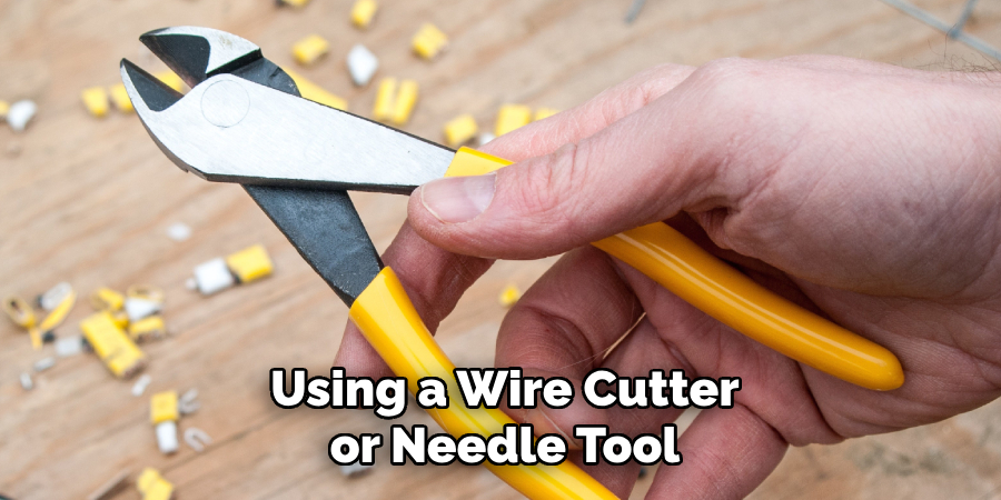 Using a Wire Cutter or Needle Tool